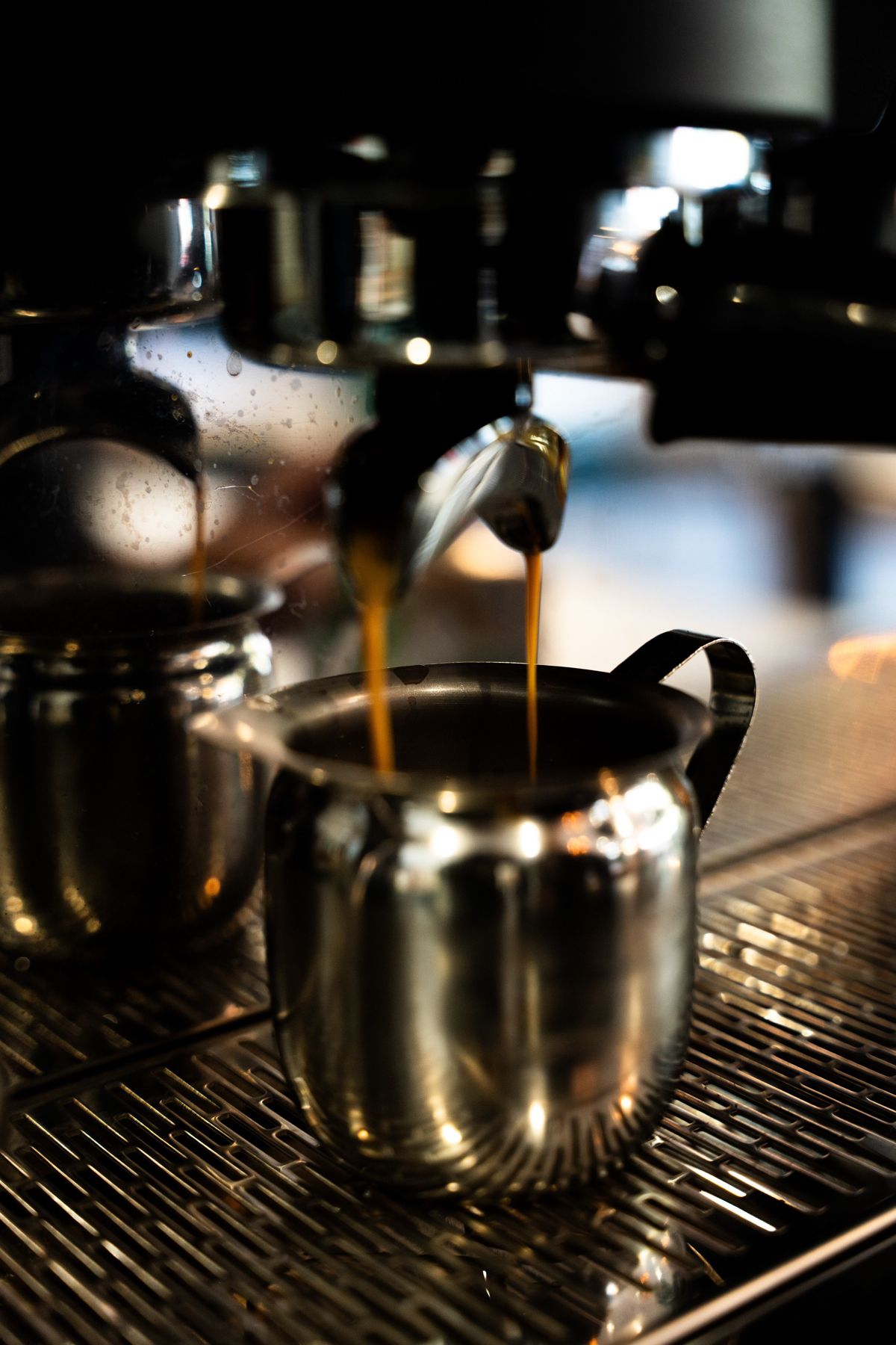 Espresso pulling into a steel pitcher